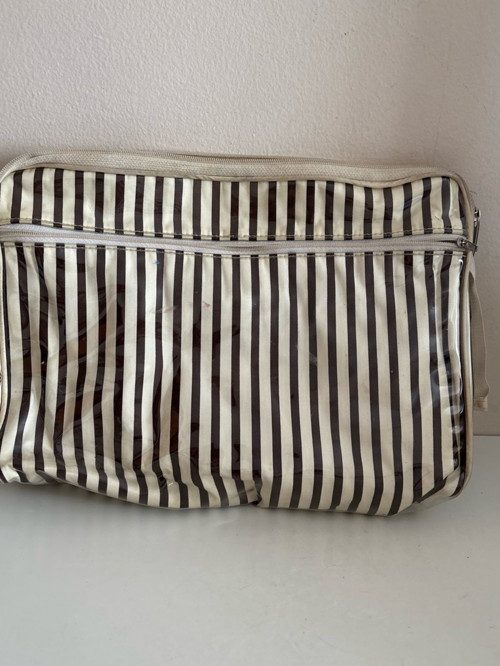 Henri bendel brown and brown used in good condition  and white vertical striped